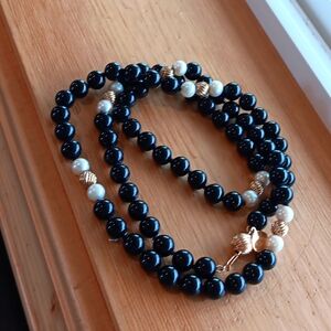 Timeless black, gold and pearl beaded necklace
